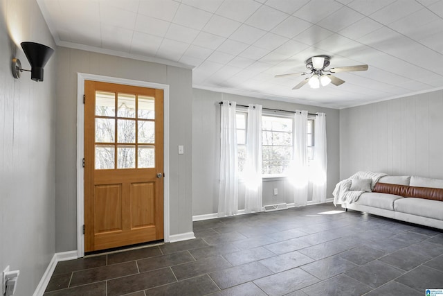 65 Wooley Rd, Brent, AL 35034 - foyer with wood walls, a ceiling fan, baseboards, visible vents, and ornamental molding