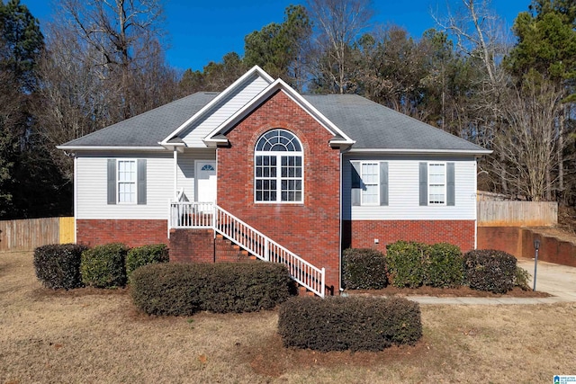 view of front of home with a front yard