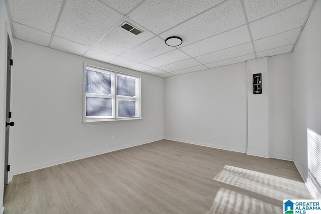 empty room with light hardwood / wood-style floors