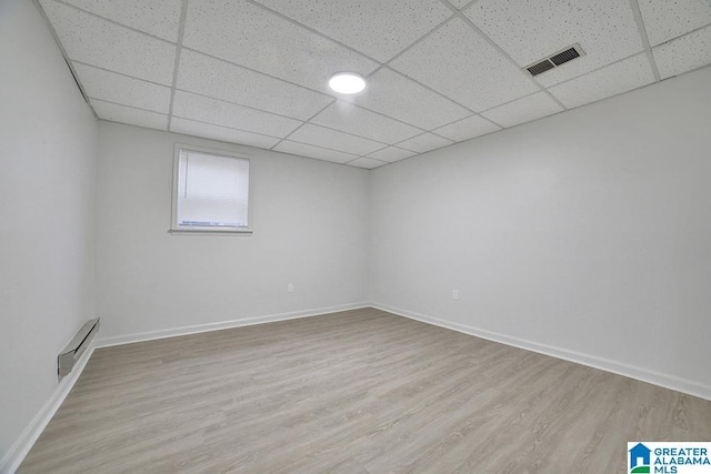 spare room with light wood-type flooring