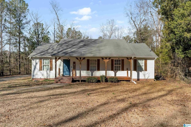 view of front of home featuring a front yard and a porch