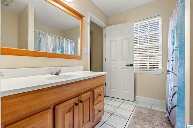 bathroom featuring tile patterned floors and vanity