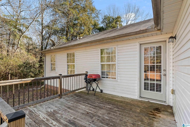 wooden deck with area for grilling