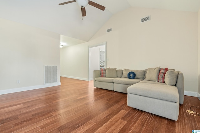 living room featuring hardwood / wood-style flooring, ceiling fan, and high vaulted ceiling