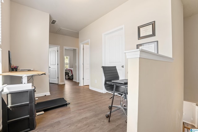 office with wood-type flooring