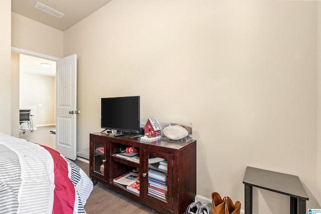 bedroom with light hardwood / wood-style flooring