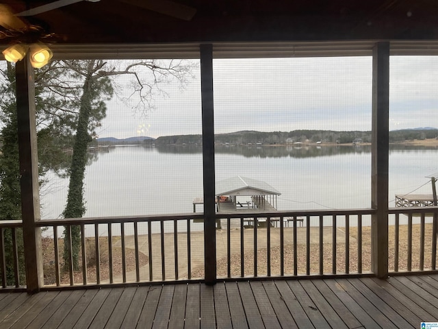 wooden deck with a water view