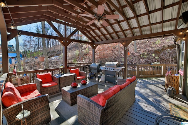 wooden deck with a grill, an outdoor hangout area, a gazebo, and ceiling fan