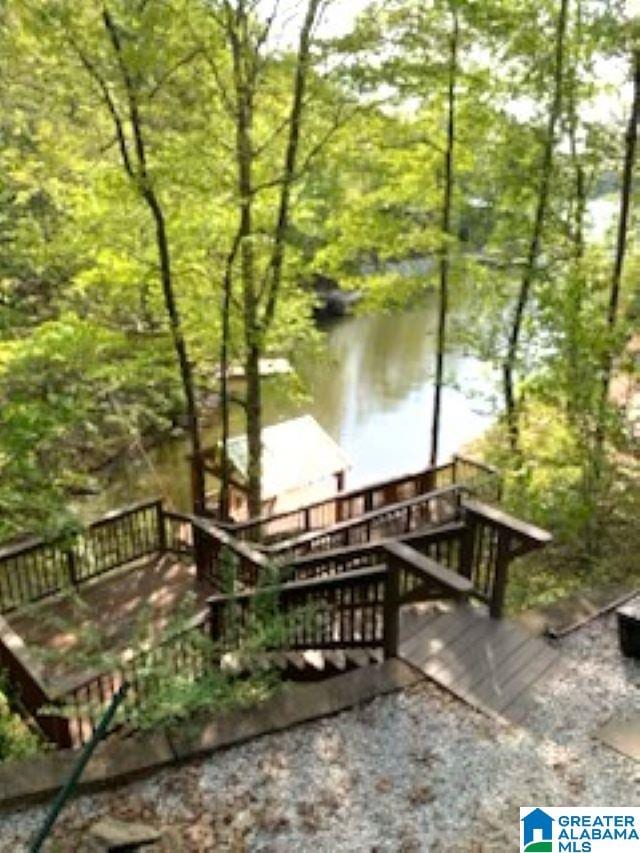 deck featuring a water view