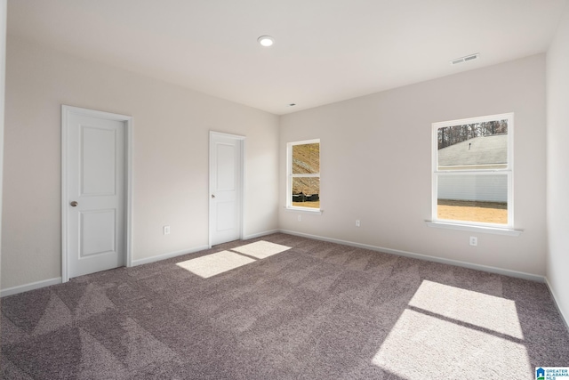 unfurnished bedroom featuring carpet flooring