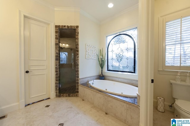 bathroom featuring ornamental molding, toilet, and shower with separate bathtub