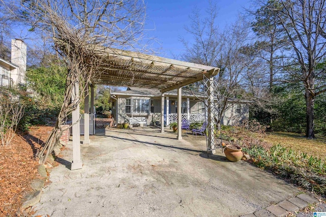 view of patio / terrace with a carport