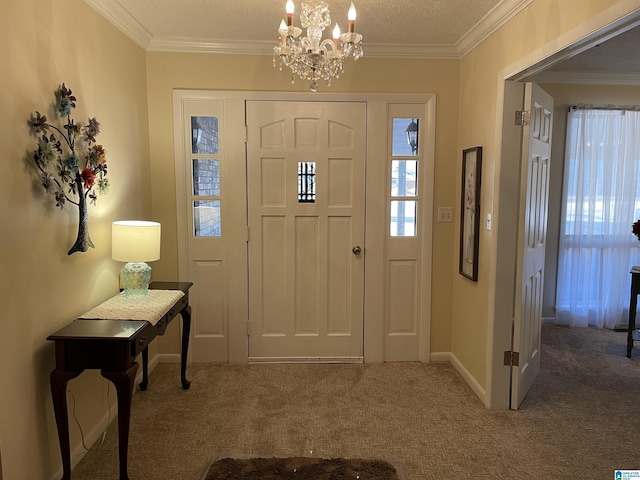 carpeted entrance foyer with crown molding, a textured ceiling, and an inviting chandelier