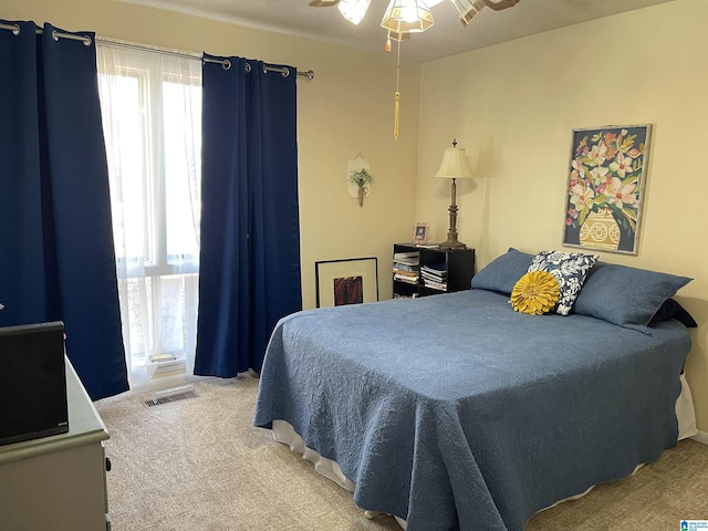 bedroom featuring carpet and ceiling fan