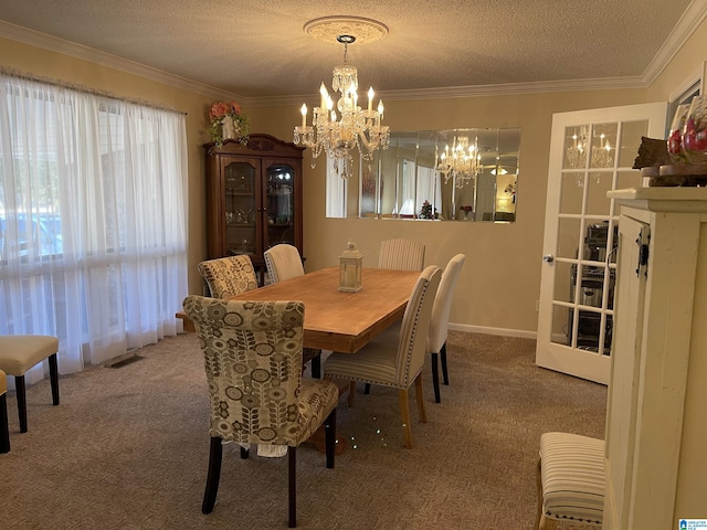 carpeted dining space featuring ornamental molding, a textured ceiling, and a notable chandelier