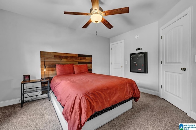 carpeted bedroom featuring ceiling fan