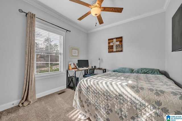 carpeted bedroom with multiple windows, ornamental molding, and ceiling fan