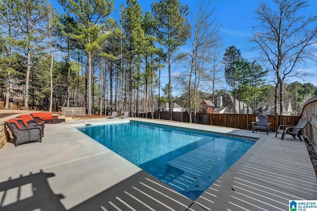 view of swimming pool with an outdoor hangout area and a patio area