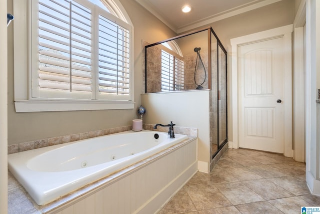 bathroom with crown molding, tile patterned floors, and separate shower and tub