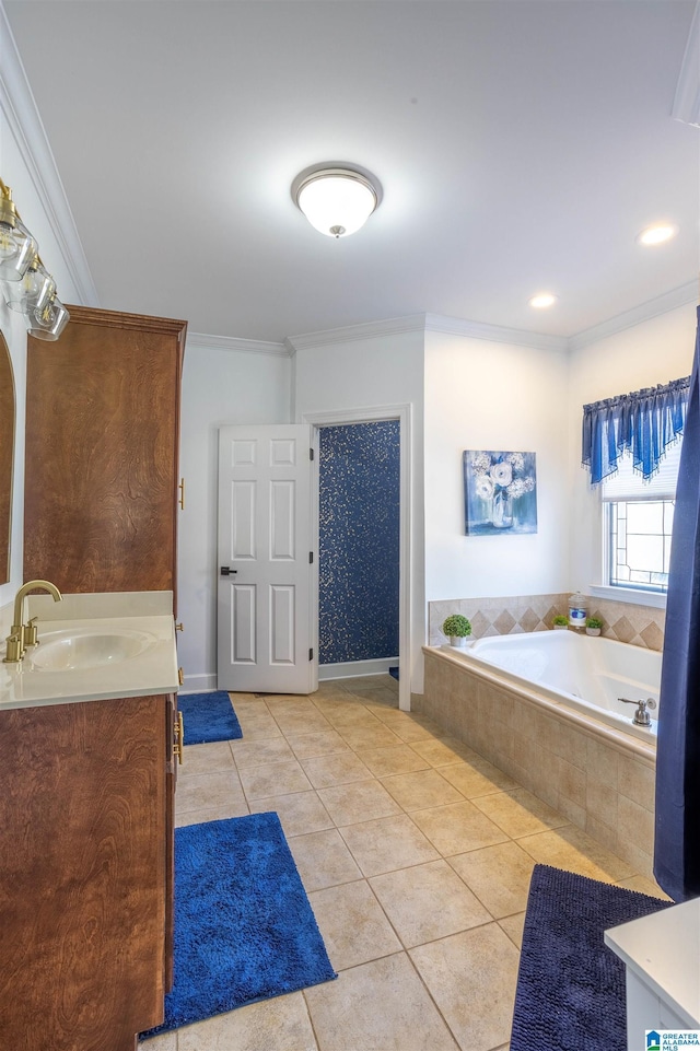 bathroom featuring a relaxing tiled tub, ornamental molding, vanity, and tile patterned flooring