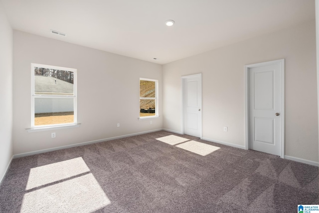 unfurnished bedroom with carpet floors