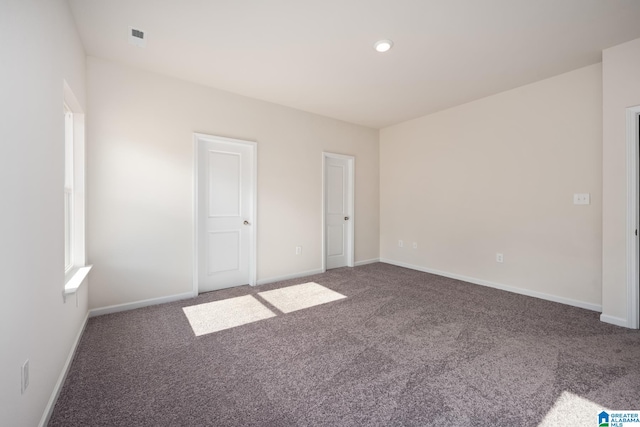 view of carpeted spare room