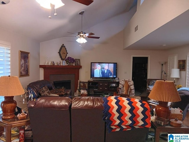 living room with vaulted ceiling and ceiling fan