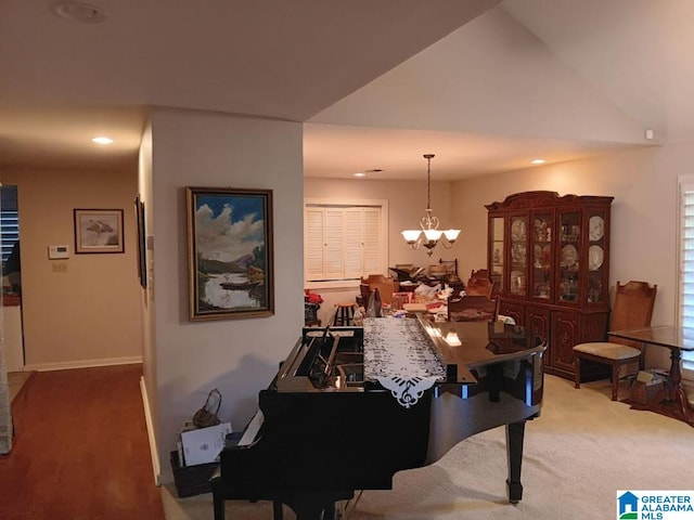 dining space with a chandelier