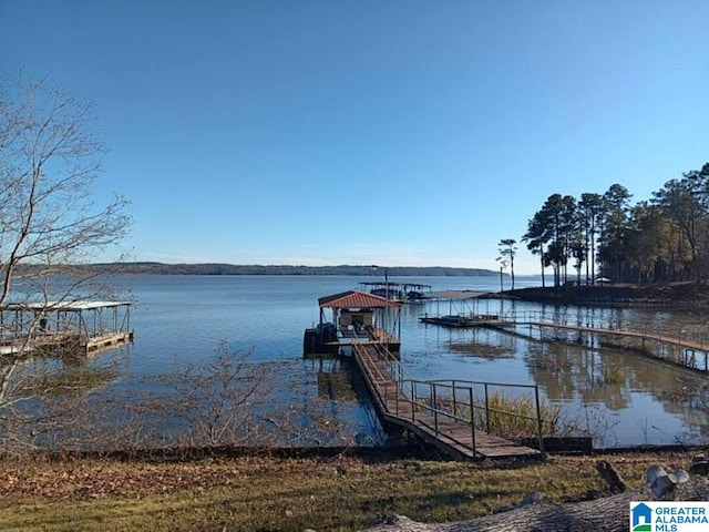 view of dock with a water view