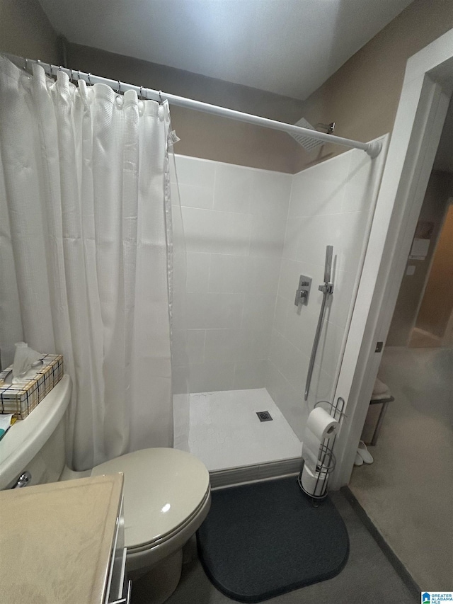 bathroom featuring walk in shower and toilet