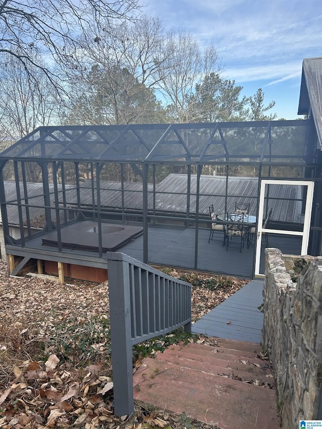 view of dock with glass enclosure