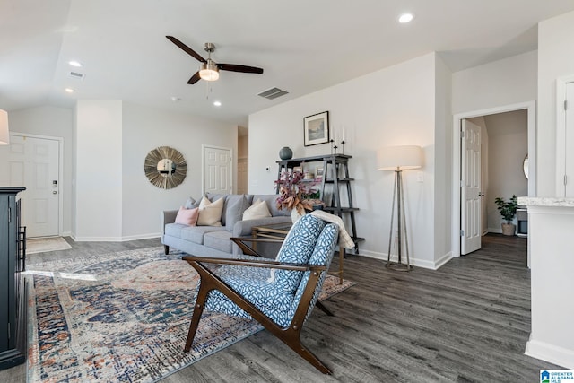 living room with wood finished floors, visible vents, and recessed lighting