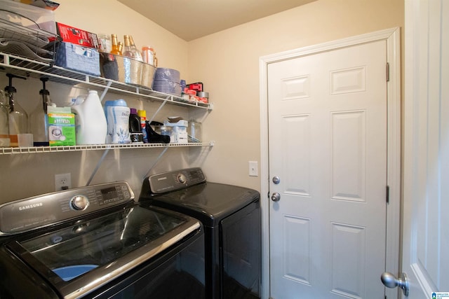 laundry area featuring washing machine and dryer