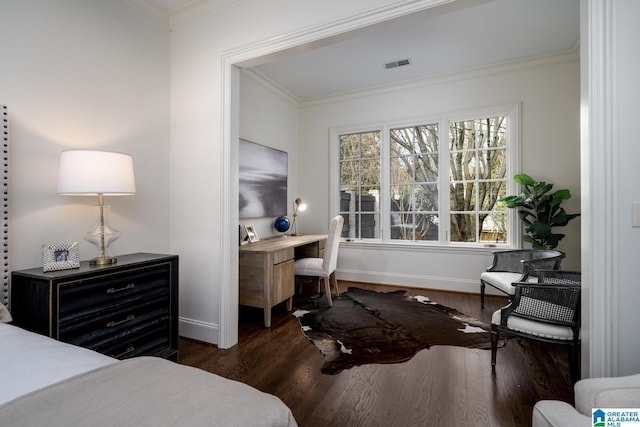 bedroom featuring dark wood-type flooring and ornamental molding