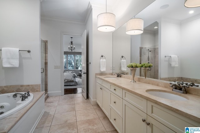 bathroom with vanity, crown molding, tile patterned floors, and independent shower and bath