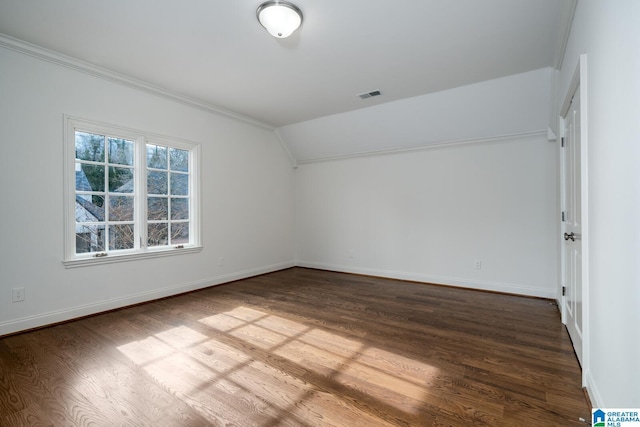 bonus room with vaulted ceiling and wood-type flooring