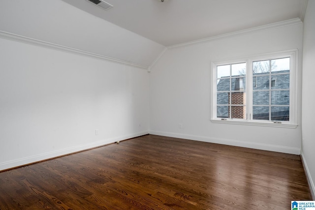 interior space featuring crown molding, lofted ceiling, and dark hardwood / wood-style flooring