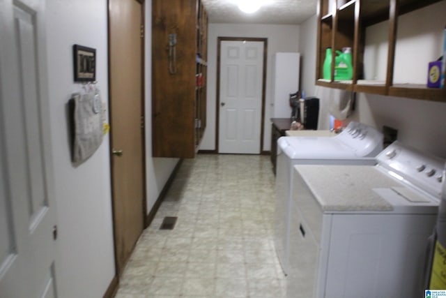 laundry area featuring washer and clothes dryer