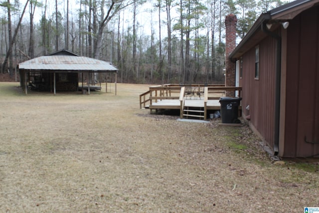 view of yard featuring a deck