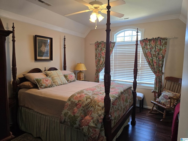 bedroom with dark wood-type flooring, ceiling fan, ornamental molding, and lofted ceiling