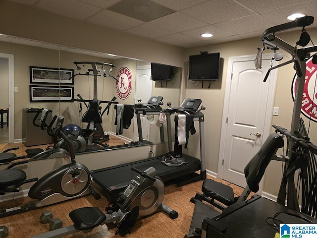 exercise room with a drop ceiling