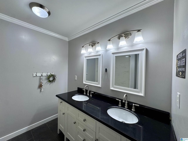 bathroom with ornamental molding, tile patterned floors, and vanity