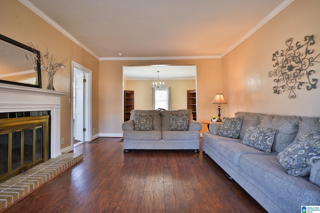 living room featuring crown molding, a brick fireplace, a notable chandelier, and dark hardwood / wood-style flooring