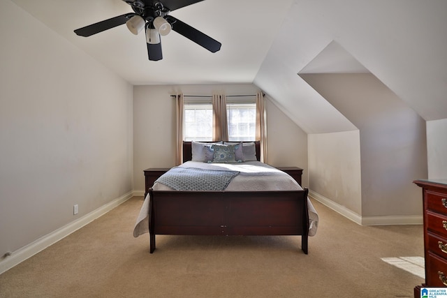 carpeted bedroom featuring vaulted ceiling and ceiling fan