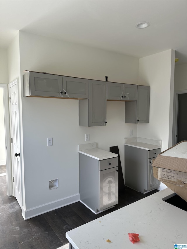 kitchen featuring dark hardwood / wood-style floors and gray cabinets