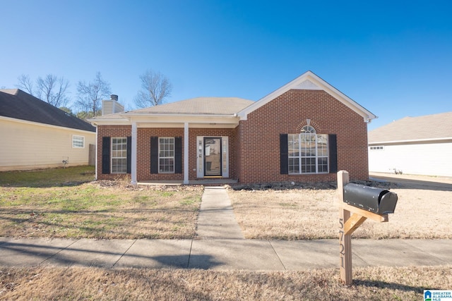 ranch-style house with covered porch