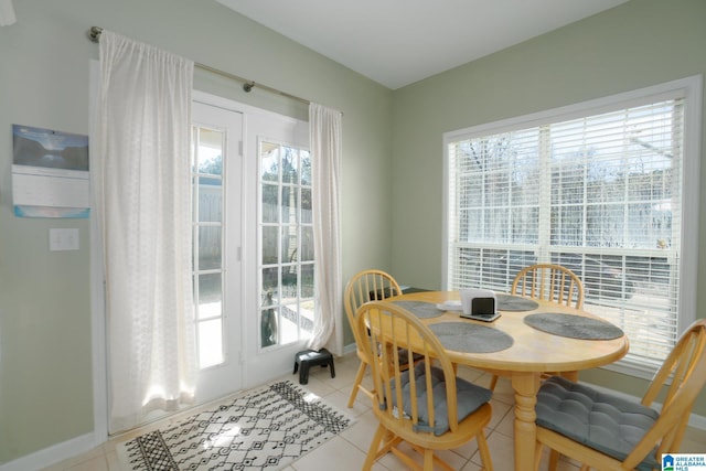 dining room featuring light tile patterned floors