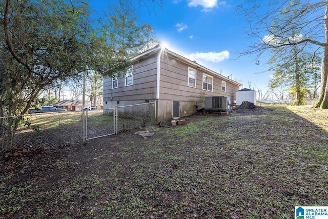 view of property exterior with central AC unit