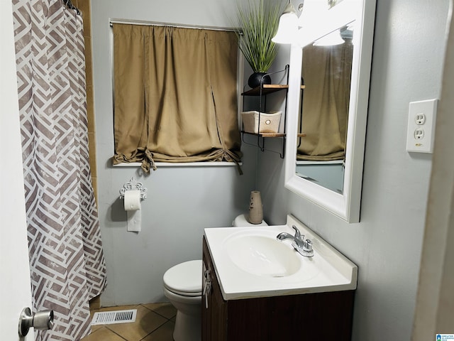 bathroom featuring tile patterned floors, vanity, toilet, and a shower with shower curtain