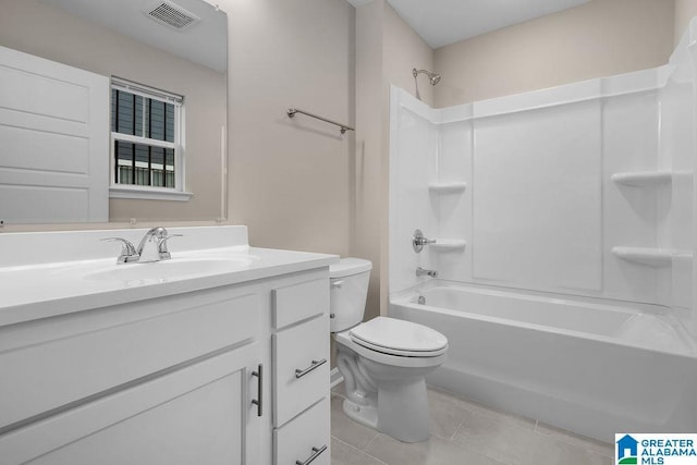 full bathroom featuring vanity, tile patterned flooring, toilet, and washtub / shower combination